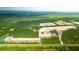 Aerial view showcasing land being developed for a new residential community at 5536 Bowmore Blvd, Ravenel, SC 29470