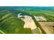 Aerial view of a new construction site with forests and open fields at 5568 Bowmore Blvd, Ravenel, SC 29470