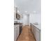 Well-equipped kitchen with stainless steel appliances, granite countertops, and gray cabinets at 5568 Bowmore Blvd, Ravenel, SC 29470