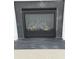 Close up of gas fireplace featuring faux logs at 8801 Lannister Dr, North Charleston, SC 29420