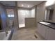 Modern bathroom featuring a spacious shower, toilet, and a sleek vanity at 928 Tiger Loop, Saint Stephen, SC 29479