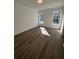 Sunny bedroom with hardwood floors and windows at 100 Gray Pine Ln, Summerville, SC 29483
