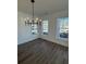 Bright dining room with hardwood floors and chandelier at 100 Gray Pine Ln, Summerville, SC 29483