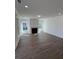Spacious living room featuring hardwood floors and a fireplace at 100 Gray Pine Ln, Summerville, SC 29483