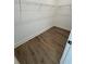 Large walk-in closet with wood-look flooring and shelving at 100 Gray Pine Ln, Summerville, SC 29483