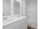 Bathroom featuring dual sinks and a tub with shower, offering modern convenience at 183 Morning View Way, Moncks Corner, SC 29461