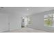 Bedroom featuring large windows and a doorway leading to a bathroom area at 183 Morning View Way, Moncks Corner, SC 29461