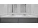 Modern bathroom with double sinks and vanity with white marble countertop at 355 Willows Crescent Dr, Moncks Corner, SC 29461