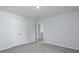Bedroom with neutral walls and carpet, closet and view to the hall at 355 Willows Crescent Dr, Moncks Corner, SC 29461