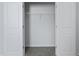 Empty walk in closet with gray carpet and white shelving at 355 Willows Crescent Dr, Moncks Corner, SC 29461