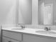 Bathroom featuring double sinks and a large mirror at 369 Willows Crescent Dr, Moncks Corner, SC 29461