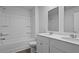 Well-lit bathroom featuring a double sink vanity, and a bathtub with shower at 361 Willows Crescent Dr, Moncks Corner, SC 29461