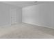 Bedroom with neutral carpet, a door, and neutral walls at 374 Willows Crescent Dr, Moncks Corner, SC 29461
