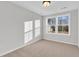 Bright bedroom with carpeted floor and large window at 166 Cantona Dr, Summerville, SC 29483