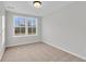 Bright bedroom with carpeted floor and large window at 166 Cantona Dr, Summerville, SC 29483