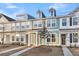 Three-story townhouses with light gray and teal siding at 166 Cantona Dr, Summerville, SC 29483