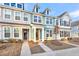 Three-story townhouses with light gray and teal siding at 166 Cantona Dr, Summerville, SC 29483