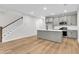 Modern kitchen with gray cabinets, stainless steel appliances, and quartz countertops at 166 Cantona Dr, Summerville, SC 29483