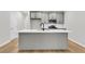 Kitchen island with white quartz countertop and gray cabinets at 166 Cantona Dr, Summerville, SC 29483
