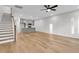 Light-filled living room with hardwood floors and modern kitchen at 166 Cantona Dr, Summerville, SC 29483