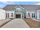 New townhouses with rear-entry garages and paved driveways at 166 Cantona Dr, Summerville, SC 29483