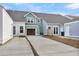 New townhouses with rear-entry garages and paved driveways at 166 Cantona Dr, Summerville, SC 29483