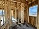 New home construction, showing the framed walls and windows of a room at 319 Trailmore Ln, Summerville, SC 29486