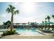 Expansive pool with lounge chairs and a clubhouse in the background at 319 Trailmore Ln, Summerville, SC 29486