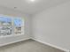 Bedroom with neutral carpet, window view, and neutral color scheme at 4 Wappoo Trace Ln, Summerville, SC 29486