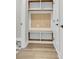 Functional entryway with a built-in bench, cubbies, and storage cabinets at 4 Wappoo Trace Ln, Summerville, SC 29486
