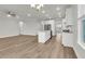 Open living space that flows into a modern kitchen at 4 Wappoo Trace Ln, Summerville, SC 29486