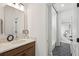 Elegant bathroom featuring a modern vanity, stylish mirror, and a connecting bedroom view at 11 Wappoo Trace Ln, Summerville, SC 29486