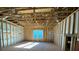 An unfinished room with exposed framing, offering a blank canvas for creating your dream space at 9 Wappoo Trace Ln, Summerville, SC 29486