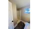 Bathroom featuring a shower stall, window, and a beige wall at 7629 Pinehurst St, North Charleston, SC 29420