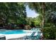 Community pool featuring lounge chairs and lush landscaping at 1712 Live Oak Park, Seabrook Island, SC 29455