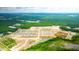 Aerial view of new homes and community amenities at 285 Blue Haw Dr, Moncks Corner, SC 29461