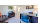 Bright home office with L-shaped desk and built-in shelving at 285 Blue Haw Dr, Moncks Corner, SC 29461
