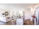 Open concept kitchen and living room with granite countertops at 285 Blue Haw Dr, Moncks Corner, SC 29461