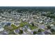 Drone shot of suburban neighborhood with mature trees at 575 Rosings Dr, Summerville, SC 29486