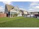 View of a spacious backyard with above ground pool and enclosed patio at 575 Rosings Dr, Summerville, SC 29486