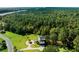 Expansive aerial view of property, home, and surrounding landscape at 7848 Pelican Bay Dr, Awendaw, SC 29429