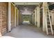 Spacious covered parking area with concrete pillars and wooden fencing at 7848 Pelican Bay Dr, Awendaw, SC 29429