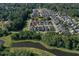 Aerial view of the community with ponds and green spaces at 208 Sweetspire Ln, Summerville, SC 29483