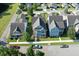 Stunning aerial view of beautiful single Gathering homes with well-manicured lawns and sidewalks at 208 Sweetspire Ln, Summerville, SC 29483