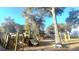 Wooden playground structure with climbing features and slide at 803 Lachicotte Creek Dr, Charleston, SC 29492