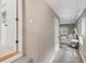 Bright hallway with beige walls and a view into a bedroom at 1466 Glencoe St, Mount Pleasant, SC 29464