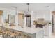 Modern kitchen with white cabinets and large island at 1466 Glencoe St, Mount Pleasant, SC 29464