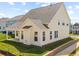 Exterior elevation showcasing the home's siding, windows, roof, and outdoor living space at 506 Fiskdale Cir, Summerville, SC 29486