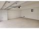 Clean, well-lit garage with paneled walls and concrete floor at 22 Iron Forge Aly, Charleston, SC 29403