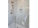 Modern shower features white subway tile, glass door and a niche for storage at 22 Iron Forge Aly, Charleston, SC 29403